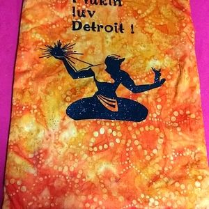 Crossbody for a tablet. Or just bag for any items great conversation piece